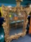 large ornate mirror with cherubs, gold colored