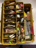 Tackle box full of vintage fishing lures