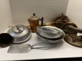Wagner ware spatula, Wilton bowls, irons, funnel, goods feather duster and cooper teapot