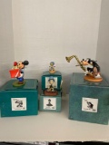 Walt Disney figurines with boxes, some with damage