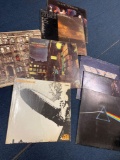 CDs and records, Led Zeppelin, Pink Floyd, Van Halen, Black Sabbath, David Bowie etc.