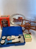 golf balls , fingerprint kit, NASCAR mug, Coca-Cola tin tray, wood plane