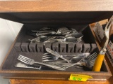 miscellaneous flatware in chest