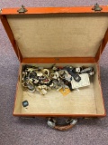 two vintage suitcases with costume jewelry