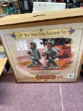 20in boy and girl figurine set grandeur Noel, appears to be new in box