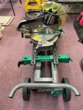 Hitachi 10in compound miter saw on stand with wheels