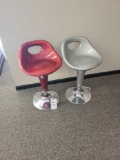 Red and grey plastic stools