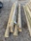 Eight assorted fence posts. Various sizes.