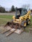 Gehl 5640 E series skid loader with material bucket and pallet forks 2300 hrs