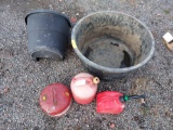 Gas Cans, Wheelbarrow, and Large Pot