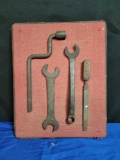 Board of antique tools, ford wrench