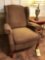 Upholstered reclining armchair