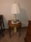 Small single drawer turned leg lamp table with lamp an alarm clock