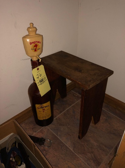 Seagrams bottle, wooden stool