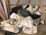 Large lot of tarps, sand bags