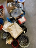 group of hardware, washers, bits, grinding wheels