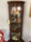 Glass antique corner cabinet