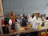 Contents of top of workbench including oils, fluids, etc.