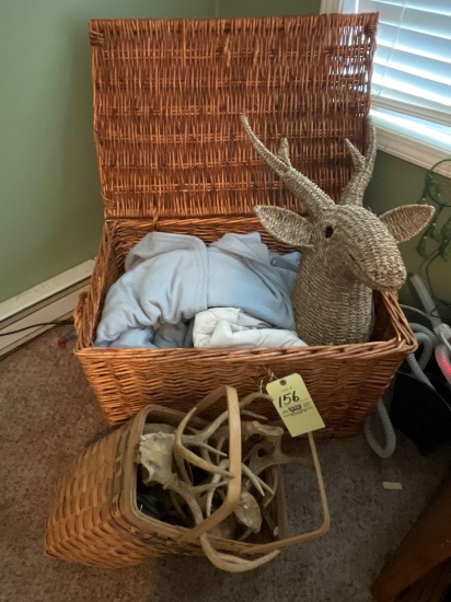 Basket blanket chest, blankets, basket feet head, basket full of antlers