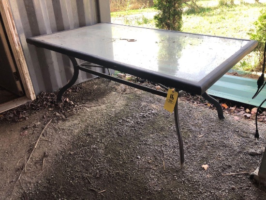 Glass-top patio table