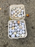 2 buckets of golf balls