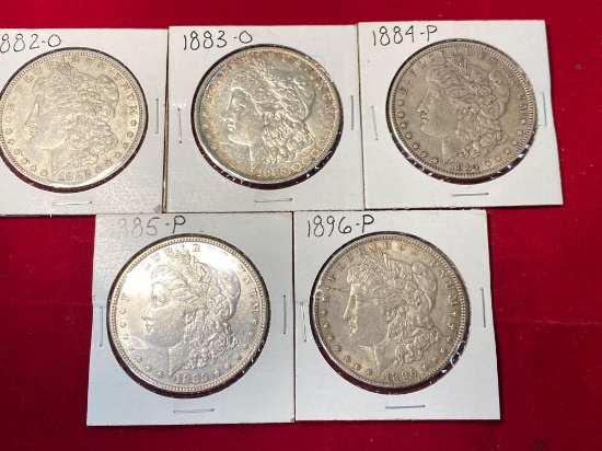 (5) Morgan silver dollars. Bid times five.