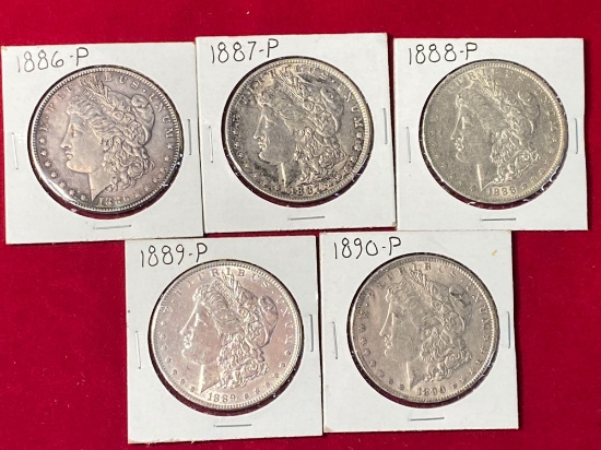 (5) Morgan silver dollars. Bid times five.