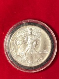 1987-P Silver Eagle dollar, one oz. fine silver.