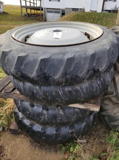 4 mounted tractor tires, Firestone 12.4-38. Bid x 4