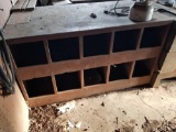 Early store counter with cubbies, double sided