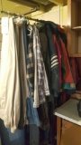 Rack of men's clothes, vintage snowsuits, coats