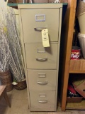 4-Drawer metal file cabinet.