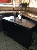 True two-tap keg cooler. 59 inches wide