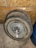 set of 6.00 - 16 tractor tires, rims in rough condition