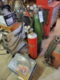 oxy acetylene torch set on cart with accessories and gauges