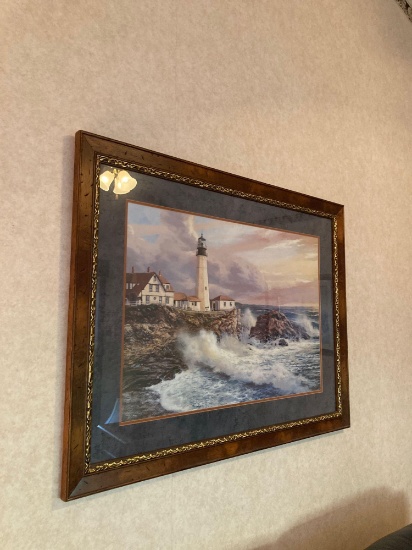 large lighthouse framed print and two other small lighthouse print