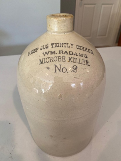 Wm. Radam's Microbe Killer 2 gallon jug.