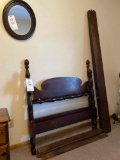 twin size bed, oval mirror