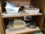contents of kitchen cupboards, utensils, casserole dishes and more