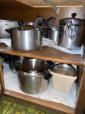 contents of kitchen cupboard, SS pots and pans, cooking utensils and more