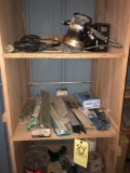 Assorted tools & hardware on shelf