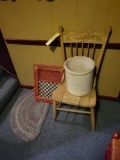 Press back chair, rug and modern checker sign
