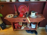 Modern red painted shelf, jars, sad irons, decor