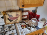 Griffith's spice jars, graniteware, plastic red pitcher and framescups