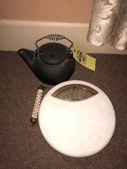 Cast iron kettle, early thermometer and scale