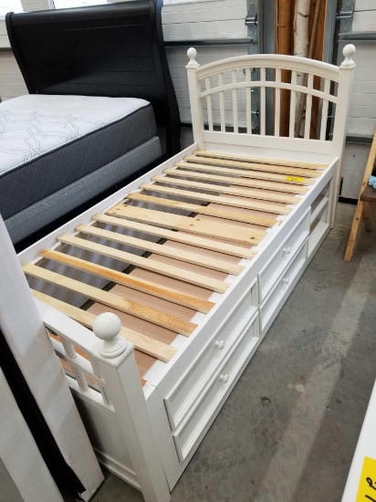 White twin bed with built in drawers, and matching dresser