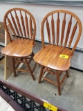 2 wood swivel stools