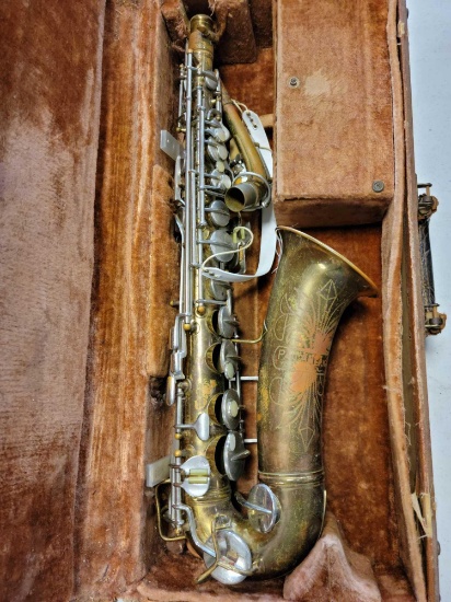 Pan American saxophone with case