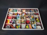 Tray of assorted glass, metal and plastic Cracker Jack toys