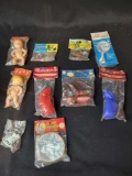Assorted plastic toys in packaging, Space Satellite, Zoo Animals, Press Gun